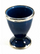 Coquetier artisanal marocain en poterie de couleur bleu petrole emaille et cercle de metal decoratif argente