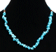 Collier ethnique artisanal imitation quartz turquoise agrementee de perles bleues et en bois