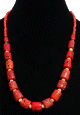 Collier ethnique artisanal imitation corail rouge et orange agremente de perles jaunes, rouges et metaliques