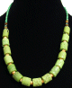 Collier ethnique imitation corail vert pistache agremente de perles vertes et jaunes et autres en bois