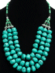 Collier traditionnel ethnique fait main imitation pierres turquoises agremente de perles et de pieces argentees