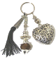Porte-cles artisanal grand coeur et breloques en metal argente cisele et pompon en sabra marron